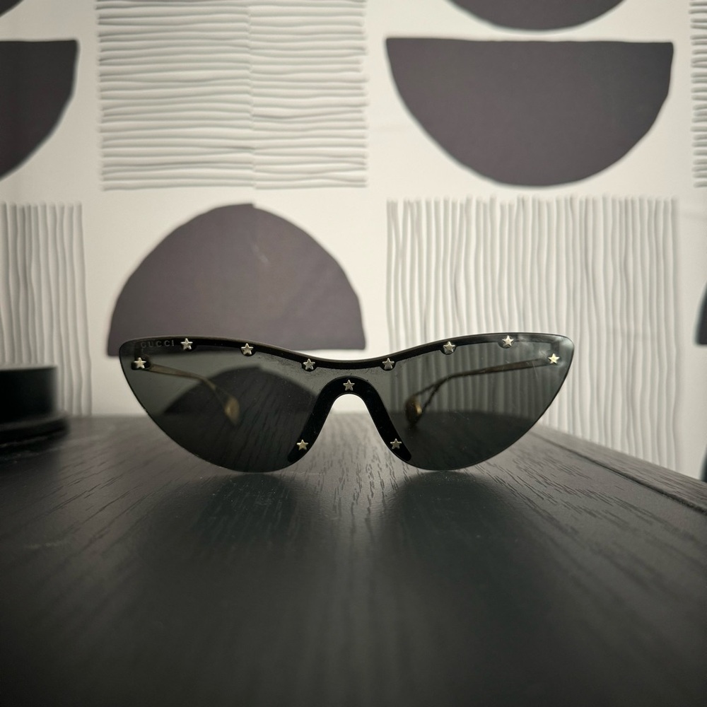 Gucci GG0666S Rimless Star Studded Sunglasses